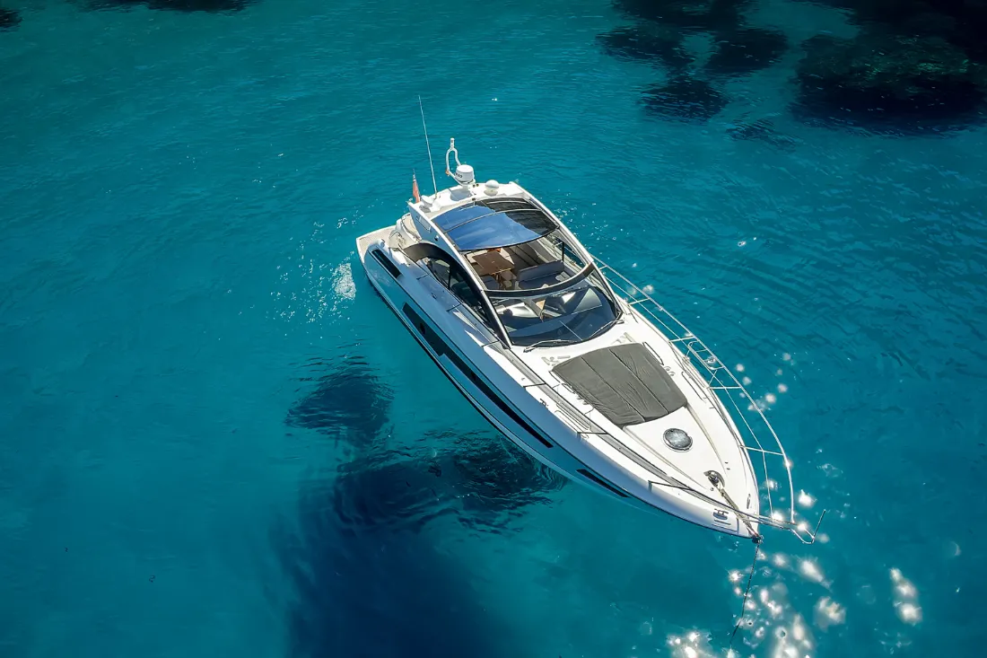 Guests on the sun deck of the Sunseeker San Remo Noon