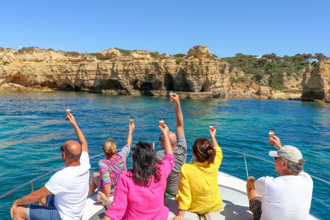 Guests by the caves on a private yacht in Albufeira
